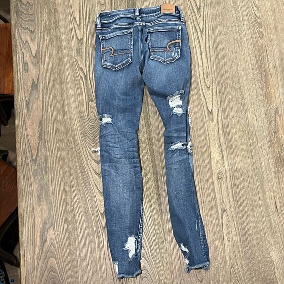 American Eagle Skinny Jeans NE(X)T Level Stretch Distressed Medium Wash Size 0 - Picture 10 of 11